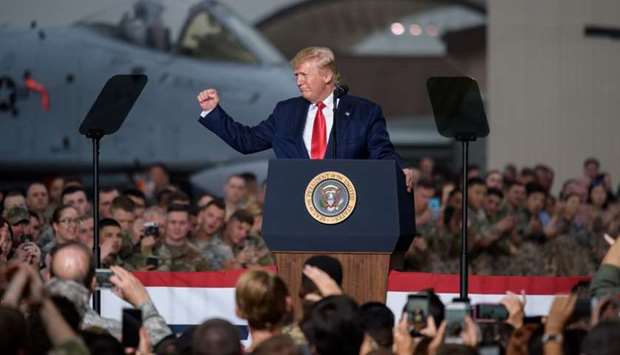 US President Donald Trump gestures during his visit to US troops based in Osan Air Base, South Korea
