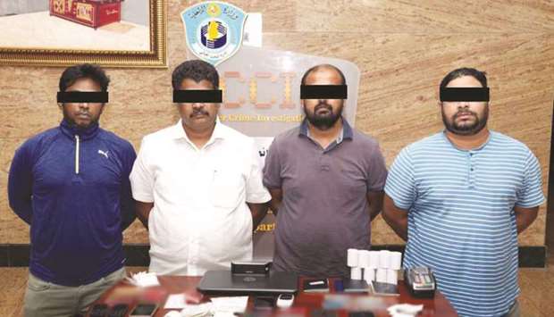 The four accused lined up after their arrest.