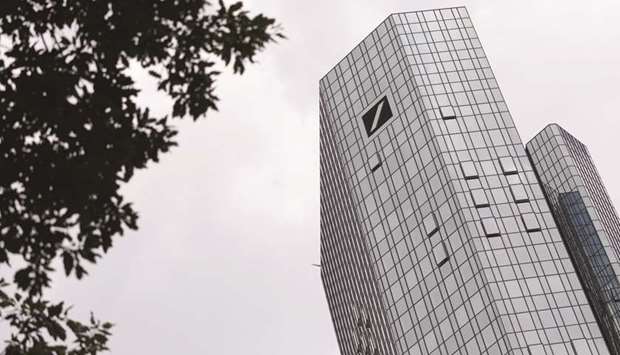 The Deutsche Bank logo is seen on the banku2019s headquarters in Frankfurt. Deutsche Bank is in the middle of a major restructuring as it tries to shrink its investment bank that has struggled to generate sustainable profits since the 2008 financial crisis.