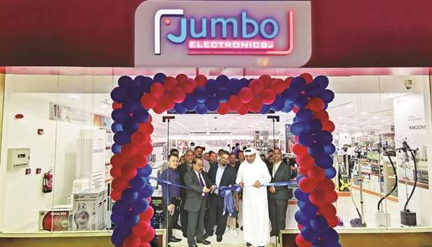 Dignitaries and officials at the inauguration of the new Jumbo Electronics store.
