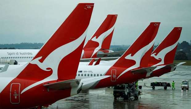 Qantas aircraft are seen on the tarmac