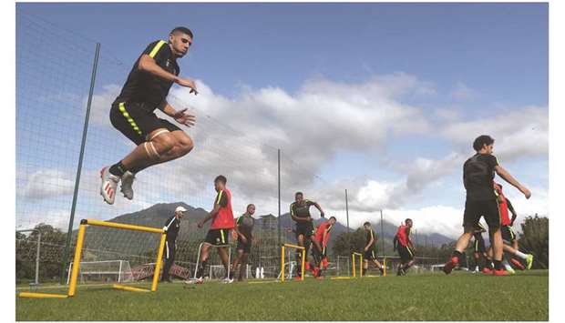 Qataru2019s Karim Boudiaf jumps over an  obstacle as he takes part in a training  session yesterday in Porto Belo, Brazil.