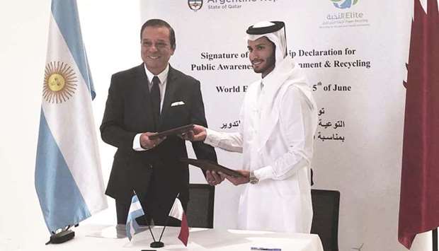 Argentinau2019s ambassador Carlos Hernandez and Elite Paper Recycling Company chairman Abdulla al-Sowaidi at the MoU signing.