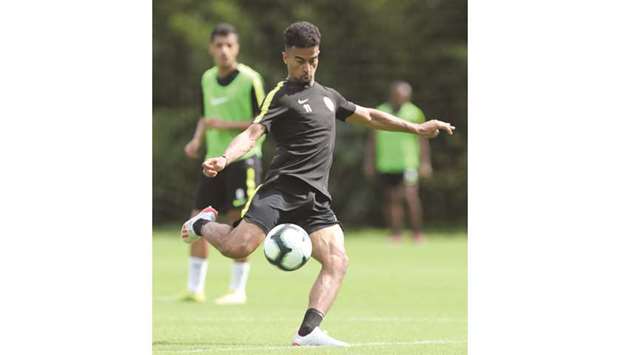 Akram Afif of Qatar in action during a training session.