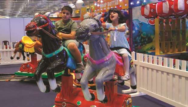 Young children enjoying the rides at SEC.