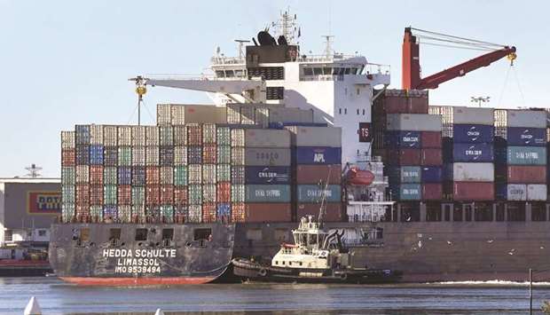 A container ship is pushed to its berth by a tug at the Port of Melbourne. Australiau2019s economic growth slowed to a decade low last quarter, underlining the need for aggressive monetary and fiscal stimulus to stop the resource-rich nation from sliding into recession after 28 straight years of expansion.