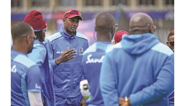 West Indiesu2019 captain Jason Holder (centre) talks with his players during a training session at Trent Bridge in Nottingham, England, yesterday. (AFP)