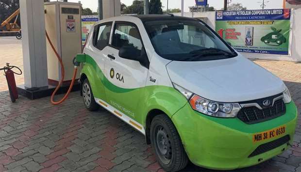 Mahindra's e2oPlus is seen at electric vehicle charging station in Nagpur