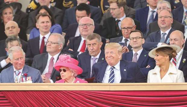 Prince Charles, Prince of Wales, Queen Elizabeth II, US President Donald Trump and First Lady Melania Trump attend an event to commemorate the 75th anniversary of D-Day, in Portsmouth, Britain, yesterday.