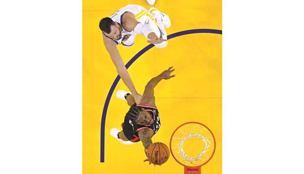 Toronto Raptors forward Kawhi Leonard shoots the ball against Golden State Warriors centre Andrew Bogut in game three of the 2019 NBA Finals at Oracle Arena. PICTURE: USA TODAY Sports