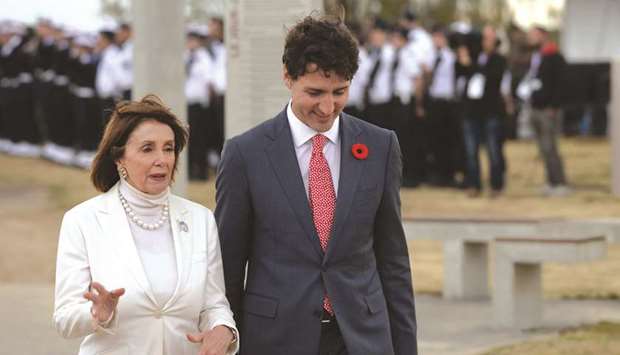 Pelosi and Canadian Prime Minister Justin Trudeau arrive to take part in an international ceremony on Juno Beach in Courseulles-sur-Mer, Normandy, northwestern France, as part of D-Day commemorations marking the 75th anniversary of the World War II Allied landings.