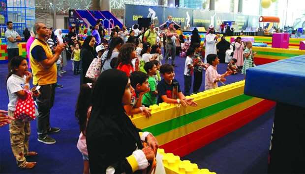 Kids wait for their turn at one of the popular games of 'SEC 2019'. PICTURE: Jayaram
