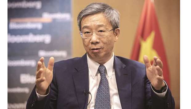 Yi Gang, governor of the Peopleu2019s Bank of China, speaks during an interview in Beijing. China has u201ctremendousu201d room to adjust monetary policy if the trade war with the US deepens, Yi said yesterday.