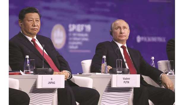 Chinau2019s Xi Jinping and Russiau2019s Vladimir Putin hit back at US global economic dominance yesterday as they took the stage together at Russiau2019s showcase business forum. With China embroiled in a trade war with Washington and Russia under Western sanctions, Xi and Putin lashed out at u201cinequalitiesu201d in the global economic system and vowed to pursue closer ties between their countries. Putin, speaking in front of political and business leaders at the annual Saint Petersburg International Economic Forum, accused Washington of seeking to u201cextend its jurisdiction to the whole worldu201d. Denouncing the u201crhetoric of trade wars and sanctionsu201d, Putin called for rethinking the role of the US dollar in global trade and slammed US pressure against Chinese tech giant Huawei. u201cThey are attempting not just to squeeze but to unceremoniously push (Huawei) out of the global market,u201d Putin said. Xi said steps needed to be taken to u201covercome inequalitiesu201d in the global economic system, adding: u201cThe aspirations 