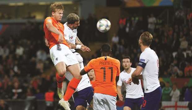 The Netherlandsu2019 Matthijs de Ligt (left) scores against England in the Nations League semi-final at Estadio D Afonso Henriques in Guimaraes, Portugal, on Thursday. (Reuters)