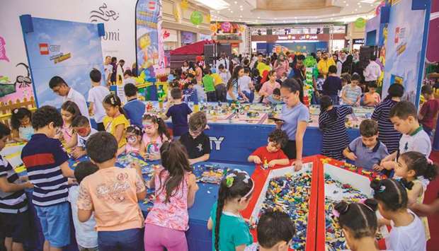 A large number of children take part in unique games at Hyatt Plaza Mall.