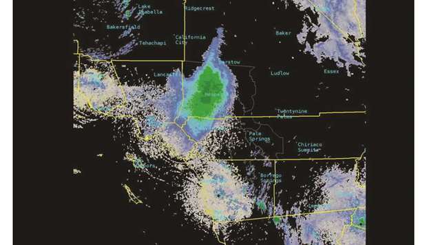 A swarm of ladybugs taking to the sky to hunt for aphids east of Los Angeles shows up as a blob in a still image from a radar screen video captured by the National Weather Service (NWS) office in San Diego.