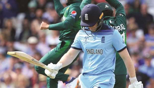 Englandu2019s captain Eoin Morgan walks back to the pavilion after losing his wicket during the 2019 ICC Cricket World Cup match against Pakistan in Nottingham, England, on Monday. (AFP)