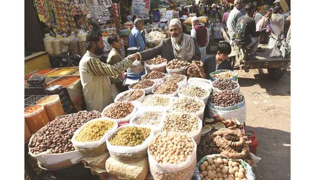 A Pakistani vendor sells dried fruits at a market in Karachi. The government of Pakistan has decided in principle to abolish zero rating for five export-oriented sectors from the next budget 2019-20. But the rate of General Sales Tax might be less than the standard rate of 17%.