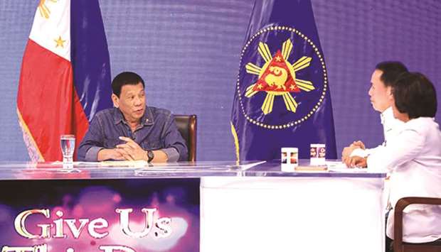 President Rodrigo Duterte is interviewed on the TV show  by Apollo Quiboloy, at the Sonshine Media Network International (SMNI) Studio in Davao City.