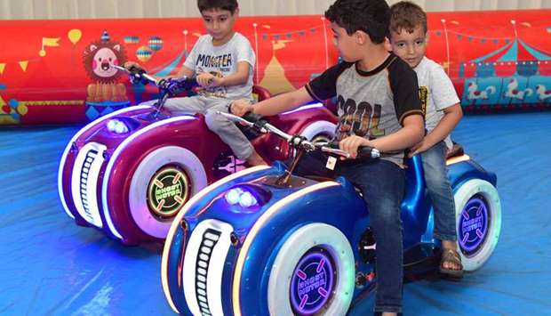 Children have fun at Souq Waqif on Sunday. PICTURE: Noushad Thekkayil.