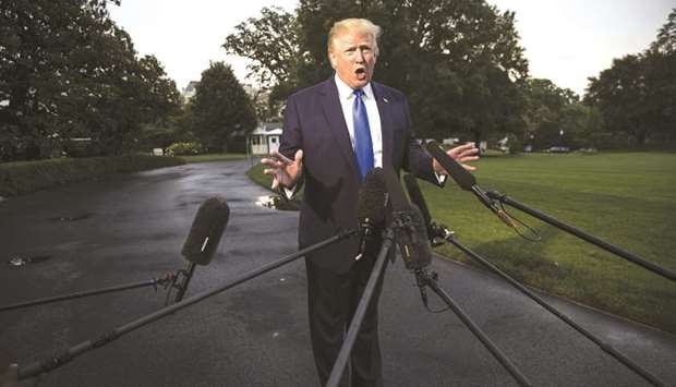 US President Donald Trump speaks to members of the media in Washington, DC. The president took issue with the contention in a New York Times article that most of the key elements agreed to between the US and Mexico on Friday had been in the works for months.