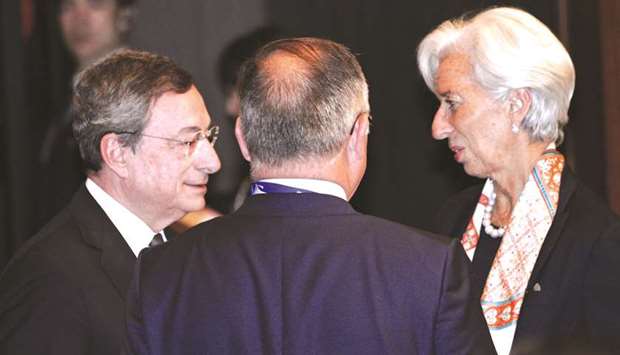 IMF managing director Christine Lagarde speaks with ECB president Mario Draghi during the Group of 20 (G20) finance ministers and central bank governors meeting in Fukuoka, Japan, on Saturday. The ECB said on Thursday that its interest rates would stay u201cat their present levelsu201d until mid-2020 but Draghi added rate setters had started a discussion about a possible cut or fresh bond purchases to stimulate inflation.