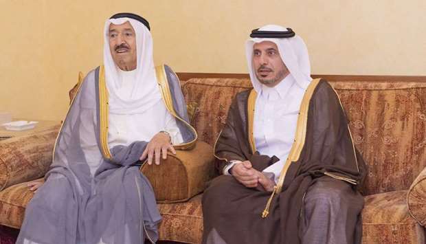 Kuwait's Amir, Sheikh Sabah al-Ahmed al-Jaber al-Sabah with HE the Prime Minister and Minister of Interior Sheikh Abdullah bin Nasser bin Khalifa al-Thani