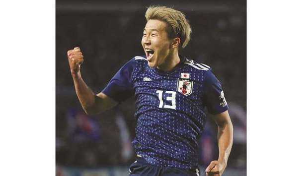 Japanu2019s forward Kensuke Nagai celebrates after scoring against  El Salvador in the friendly match in Rifu, Japan, yesterday. (AFP)