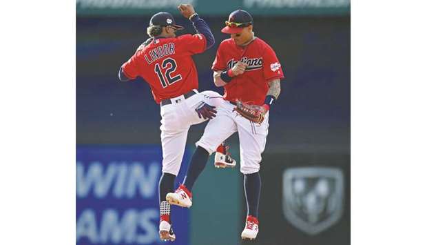 Cleveland Indiansu2019 Francisco Lindor (left) and Leonys Martin celebrate after defeating the New York Yankees. (USA TODAY Sports)