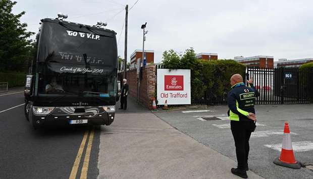 A bus carrying members of the West Indies cricket team arrives at Old Trafford cricket ground in Manchester yesterday.