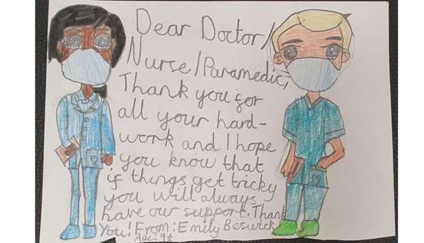 Children make 'Thank you' cards for HMC paramedics, staff