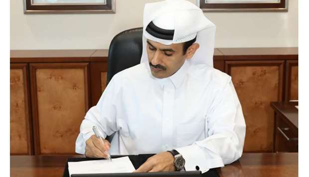 HE the Minister of State for Energy Affairs Saad Sherida al-Kaabi, also the President and CEO of QP, signs the agreement in Doha Monday.