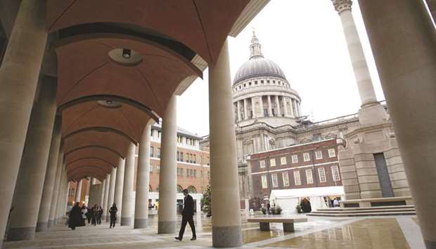 The walkway seen outside the London Stock Exchange building in Paternoster Square. The FTSE 100 closed up 0.5% to 6,105.18 points yesterday.