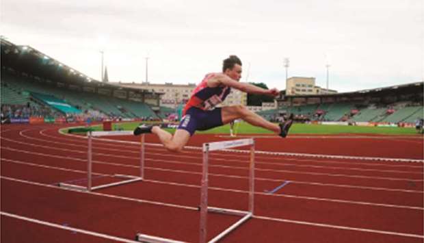Karsten Warholm of Norway competes in the 300m hurdles event during the Impossible Games 2020 at the Bislett Stadium in Oslo on Thursday. (AFP)