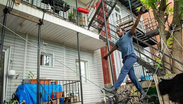 Antino Pansa, 20, trains in his backyard in Montreal.