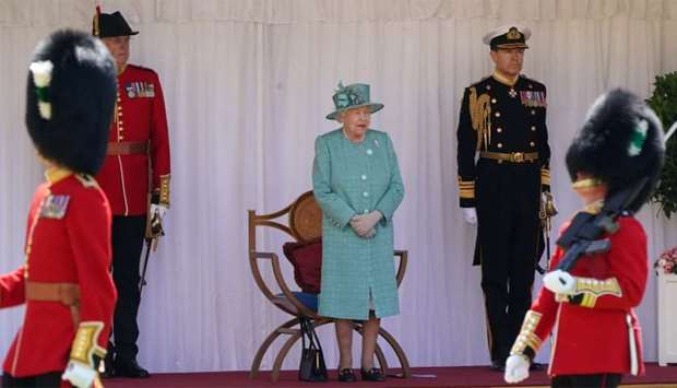 Britain's Queen Elizabeth attends a ceremony to mark her official birthday at Windsor Castle in Windsor, Britain