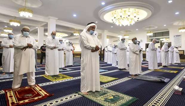 The faithful praying at a mosque in Al Hilal on Monday. PICTURE: Noushad Thekkayil
