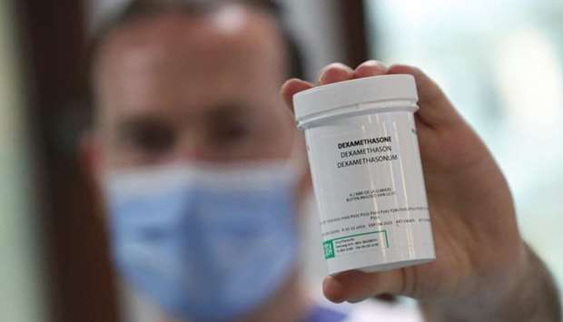 A pharmacist displays a box of Dexamethasone at the Erasme Hospital amid the coronavirus disease outbreak, in Brussels, Belgium