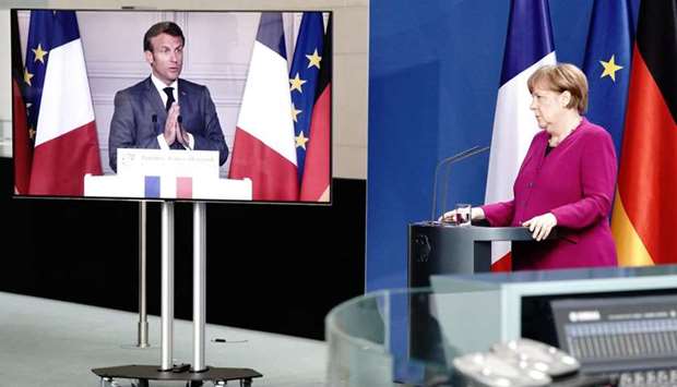 German Chancellor Angela Merkel holds a joint video news conference with French President Emmanuel Macron. European economic and political conditions could be completely transformed by the Merkel-Macron planu2019s financial innovations.