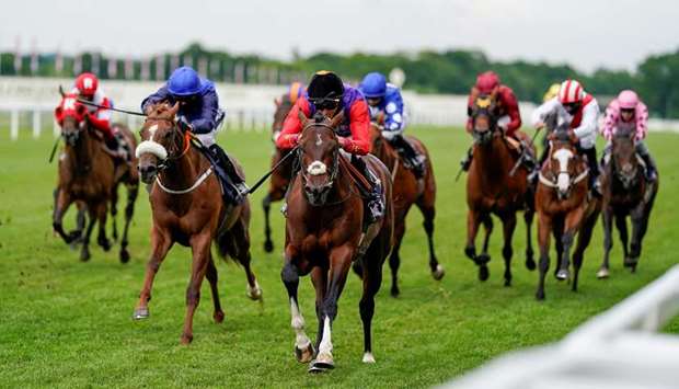 James Doyle (centre) rides Tactical to Windsor Castle Stakes win at the Royal Ascot in Ascot, United Kingdom, yesterday. (Reuters)
