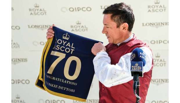 Frankie Dettori celebrates 70 wins at Royal Ascot after winning the 15:00 Hardwicke Stakes on Fanny Logan in Ascot, west of London, yesterday. (Reuters)