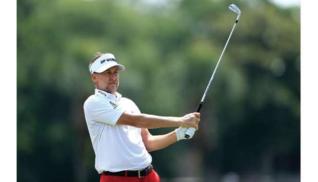 Ian Poulter of England plays his shot from the 17th tee during the first round of the RBC Heritage at Harbour Town Golf Links in Hilton Head Island, South Carolina, on Thursday. (AFP)