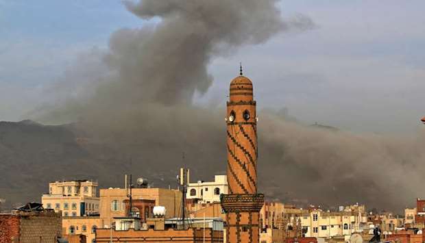 Smoke billows following an airstrike by Saudi-led coalition in the Yemeni capital Sanaa, on June 16.