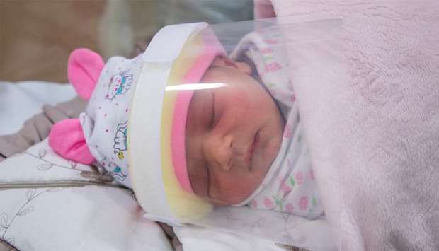 An infant face shield produced by VCUarts Qatar.rnrn