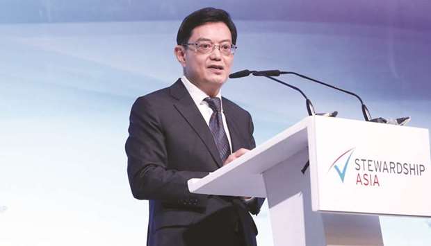 Heng Swee Keat, Singaporeu2019s deputy prime minister, speaks during the Stewardship Asia Roundtable event in Singapore (file). u201cWe are doing our best to keep viable businesses afloat, helping them hold on to their workers for as long as possible, so that you can preserve your livelihoods,u201d Heng said, while also highlighting that it was the first time the government has provided direct cash support to self-employed workers on a large scale.