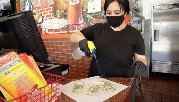 BETTER SAFE THAN SORRY: At El Tarasco, a Mexican food joint in Venice, cashier Maricela Moreno takes each new bill offered to her and sprays it down with alcohol. She leaves the dead presidents lying atop a paper towel until they have dried, before returning them to the cash drawer. Moreno laughs a bit at her money laundering (the literal and legal kind, that is) but adds: u201cWhy not? Just to be safe.u201d