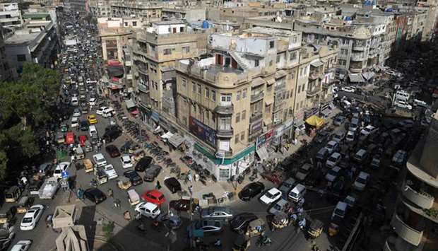 Vehicles are seen during a traffic jam in a Karachi commercial neighbourhood after the government eased a nationwide lockdown imposed as a preventative measure against the coronavirus pandemic.