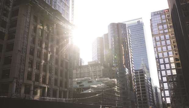 The sun shines past a building under construction in the financial district of Toronto. Net inflows into Canadian exchange-traded funds that track companies focusing on environmental, social and governance factors has surged to $544mn.