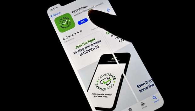 A photo illustration shows a new COVIDSafe app by the Australian government as seen on an iPhone to install in Sydney. More than 2mn Australians have downloaded a new government smartphone app designed to make coronavirus contact tracing easier, as the country moves to ease stay-at-home restrictions.
